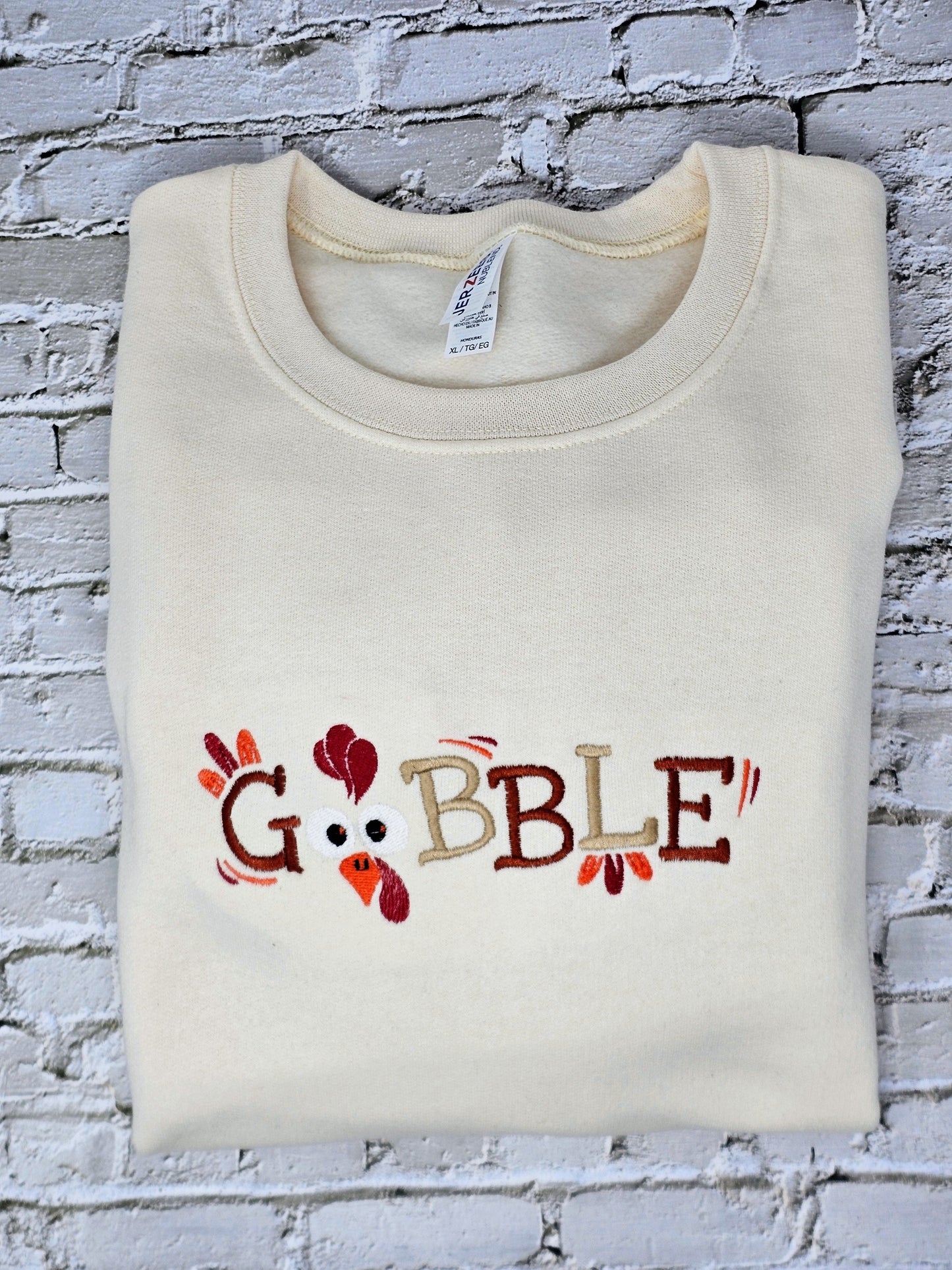 Cozy “Gobble” Thanksgiving Embroidered Sweatshirt – Cute Turkey Face Fall Crewneck for Women