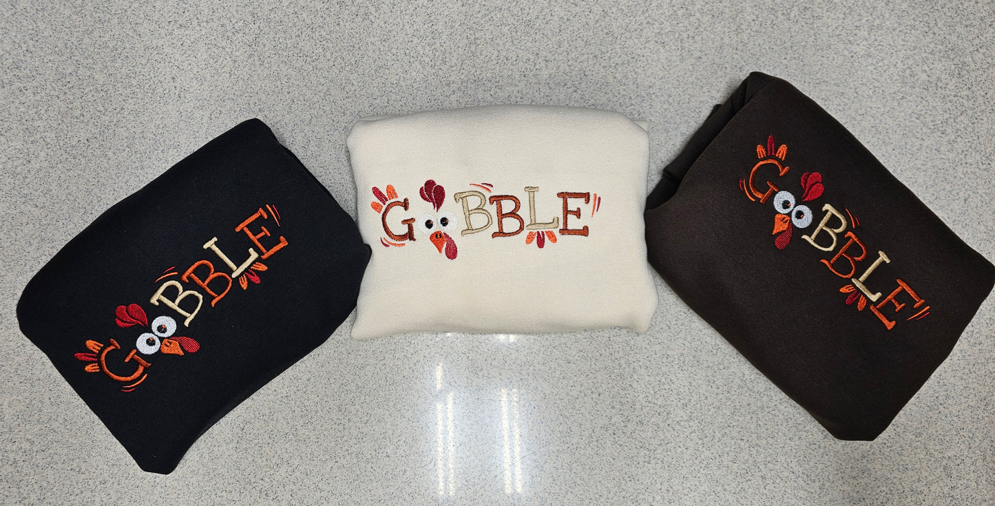 Cozy “Gobble” Thanksgiving Embroidered Sweatshirt – Cute Turkey Face Fall Crewneck for Women